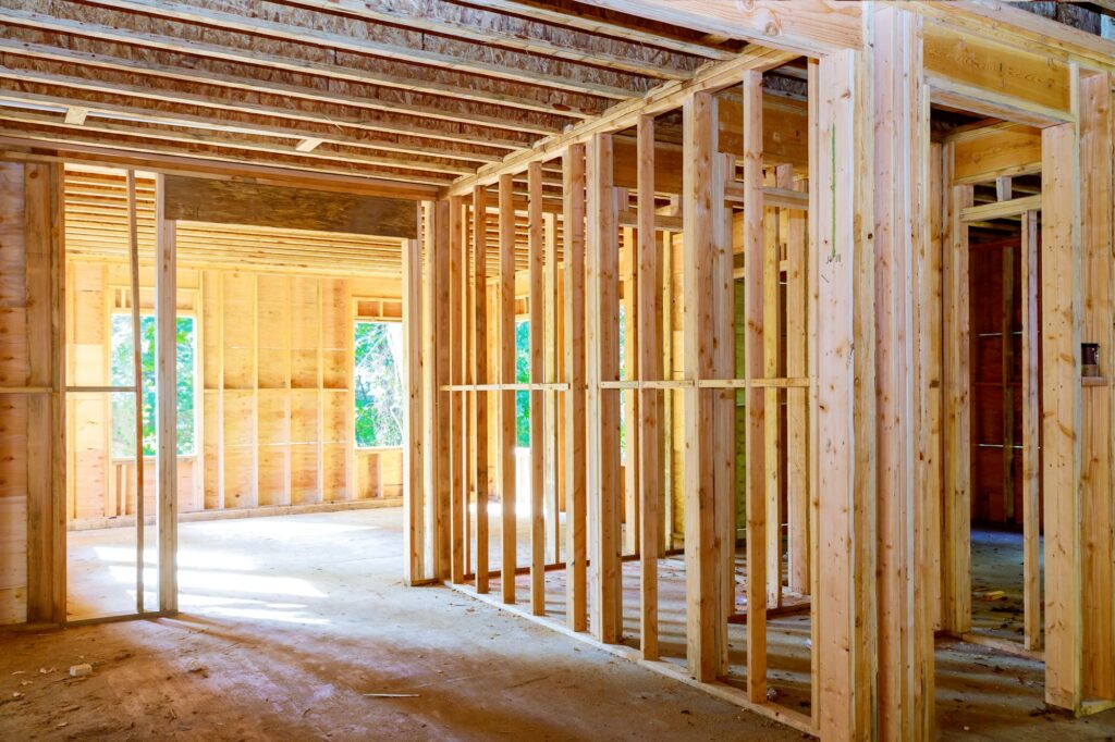 Wooden house roof building frame structure on a new development framing of under construction